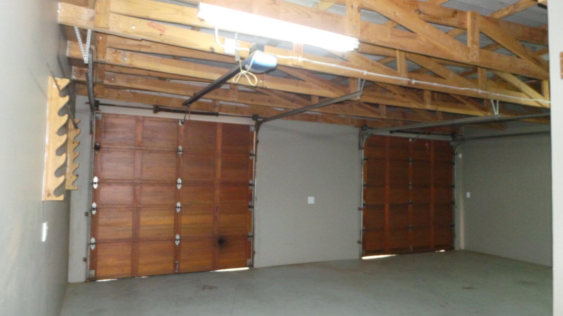 Double garage that could fit 3 small cars