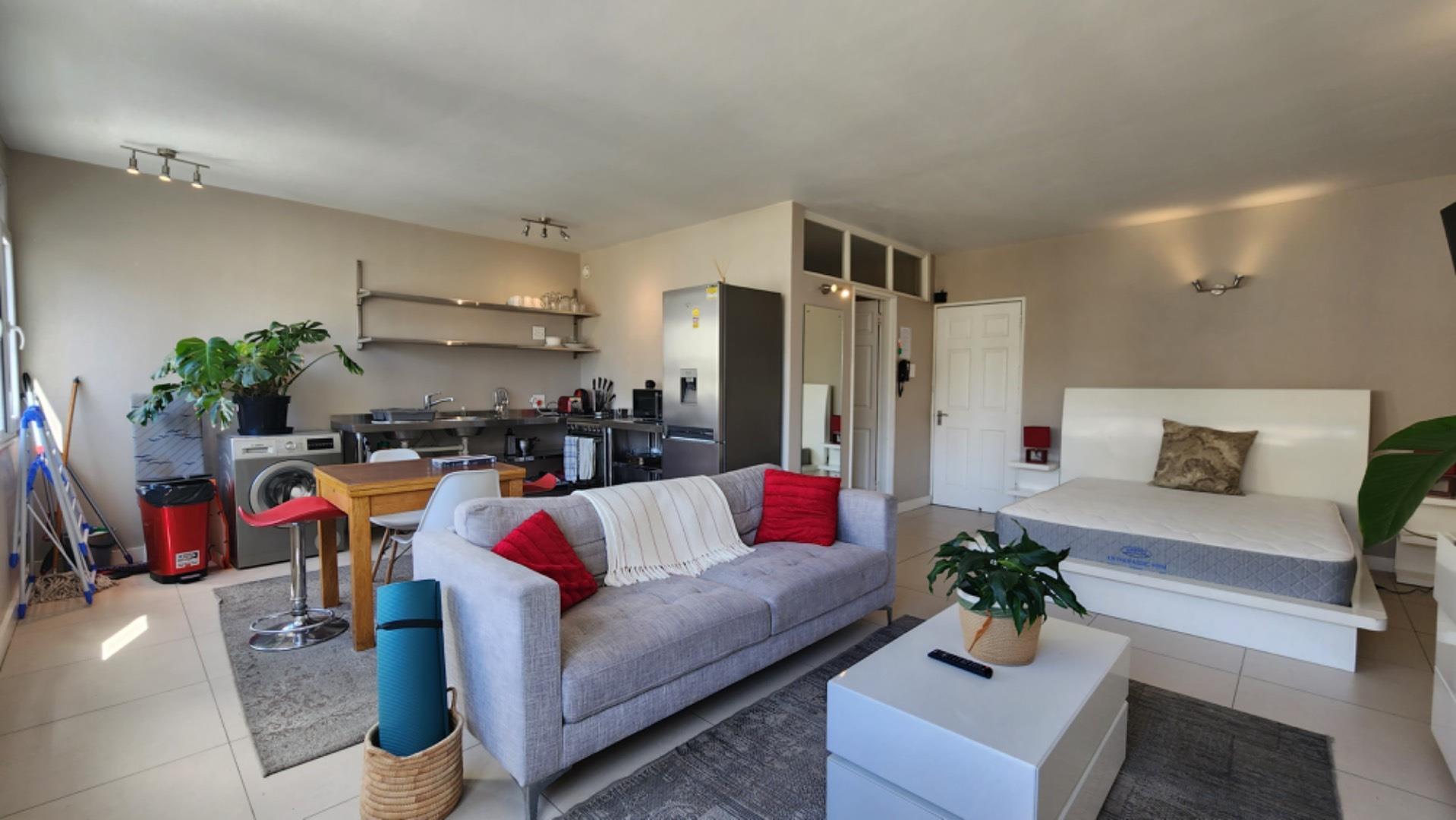 Fully furnished apartment with secure parking, laundry, and mountain