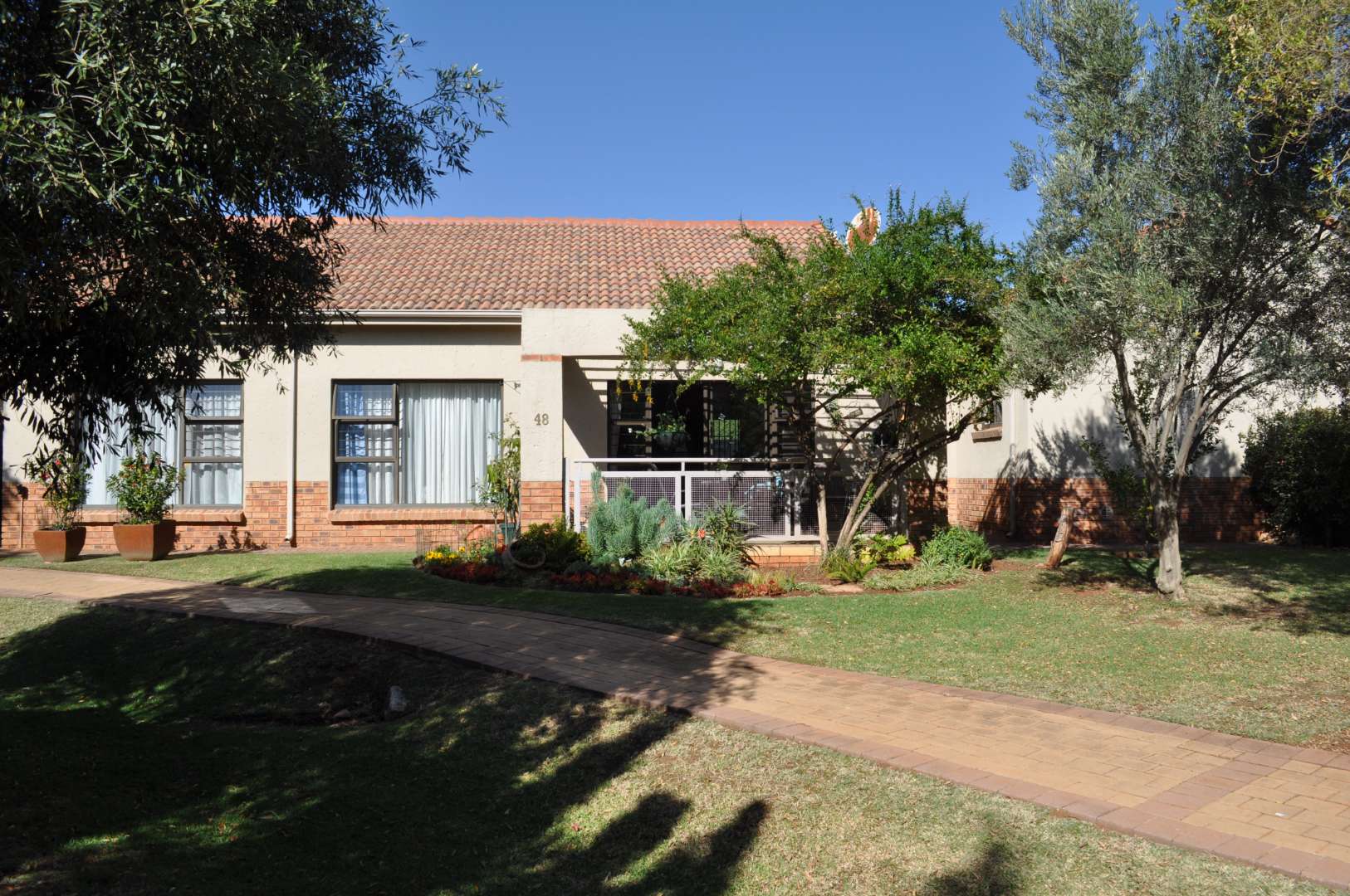 For Sale Hazeldean Retirement Village Townhouse with Gardens, Pools