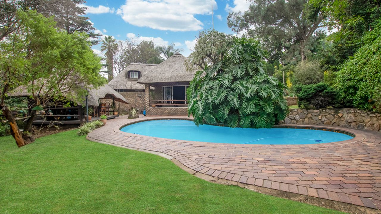 Enchanting Thatched House For Sale in Bryanston, Serene Living