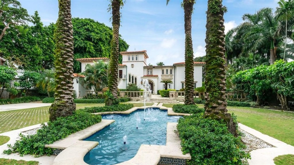 Buy a Miami mansion from a German shepherd